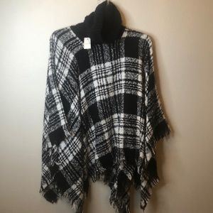 Black and white sweater turtleneck poncho
